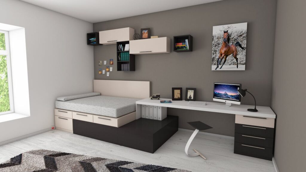 pexels photo 439227 Stylish minimalist bedroom with modern furnishings and workspace area, perfect for home offices.