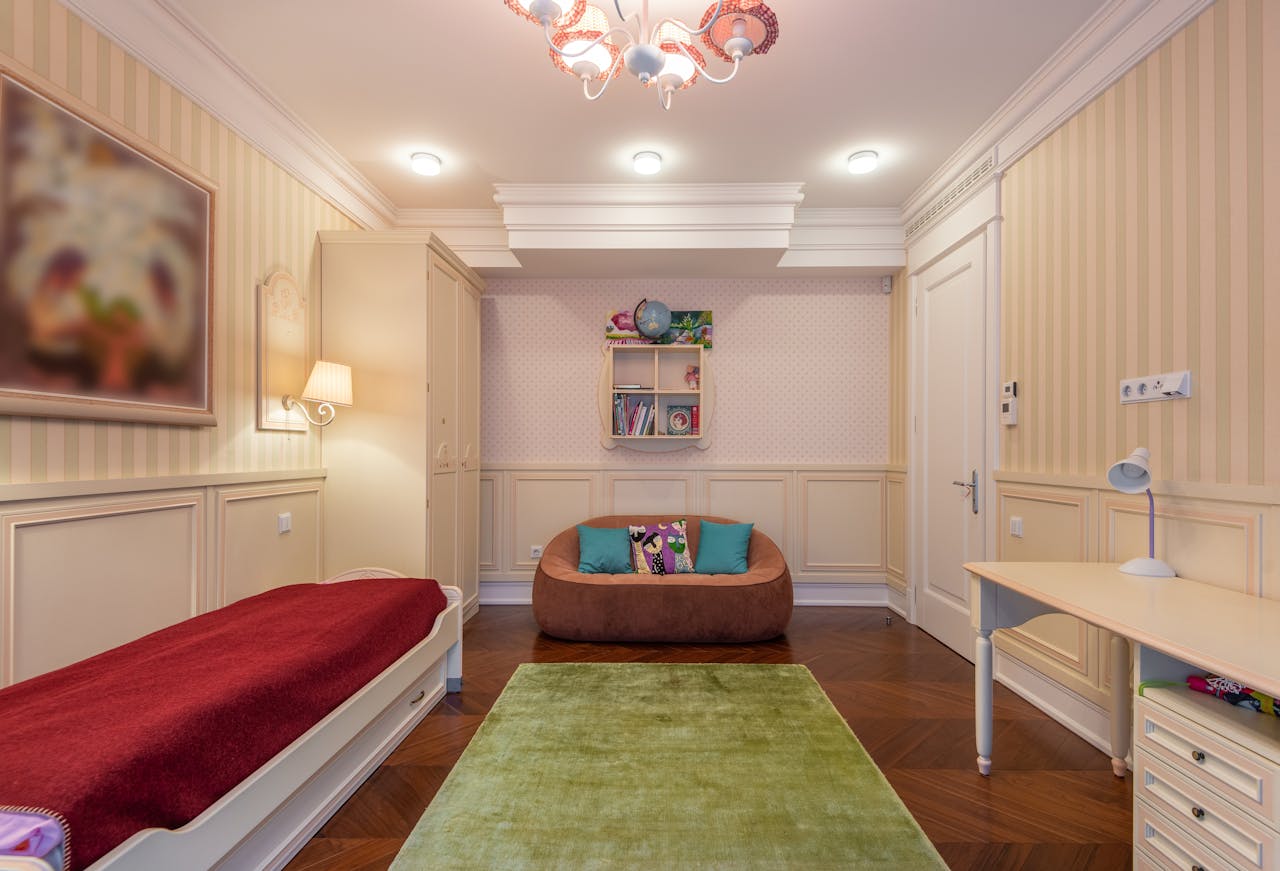 Stylish children's bedroom showcasing elegant decor and comfortable furniture.